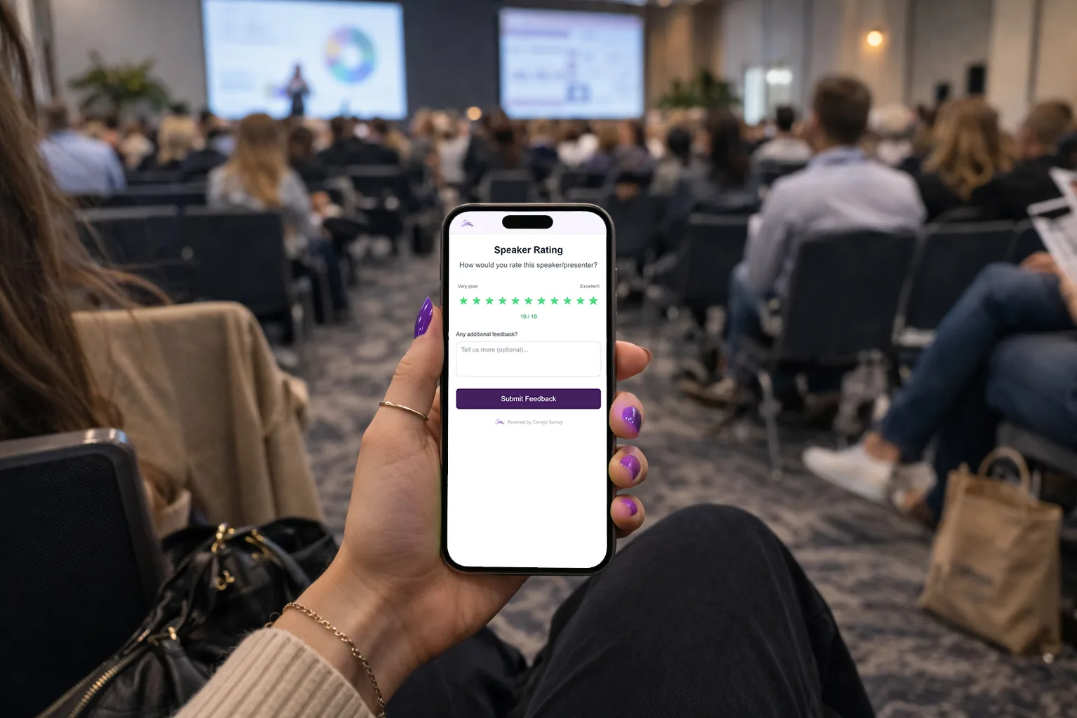 Attendee answering a live survey on a phone during an event